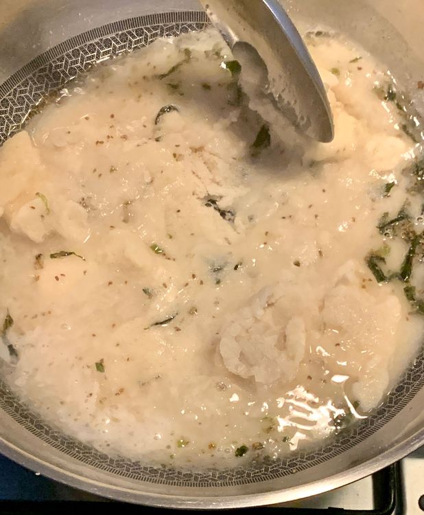 Step 1.3: Combine semolina (suji) and poha into the pan, mixing until they form a slightly sticky dough