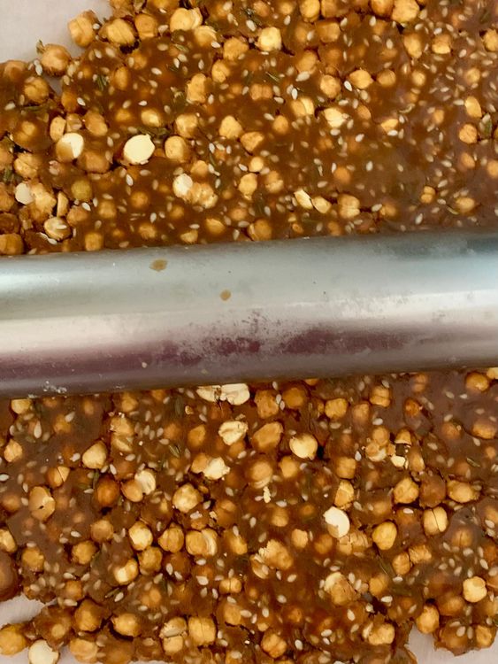 Step 4.2: Transfer the mixture right away onto a greased plate or parchment paper