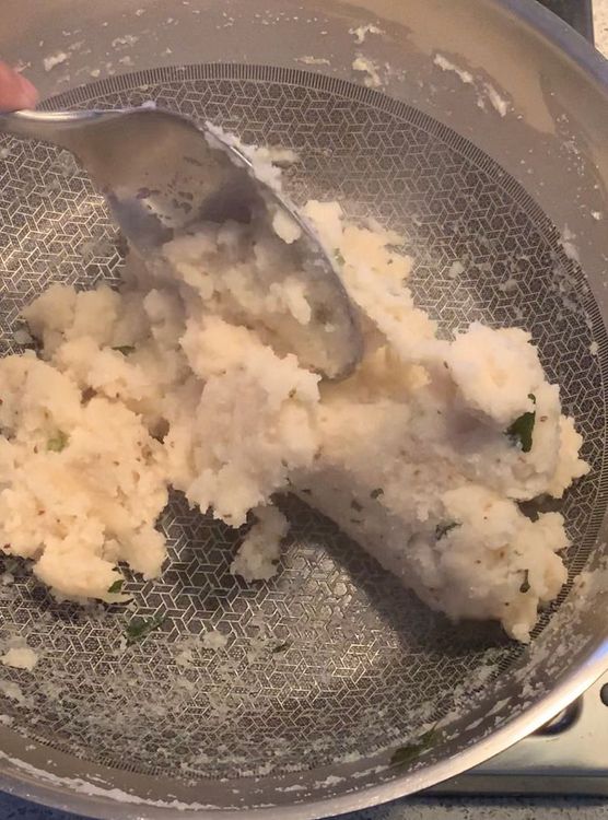 Step 1.5: Combine semolina (suji) and poha into the pan, mixing until they form a slightly sticky dough
