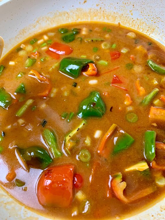Step 6.2: Pour in the prepared sauce and 1 cup of water