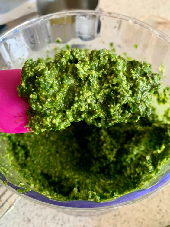 Step 1.1: With the blender running, slowly pour in olive oil until the pesto turns smooth and creamy