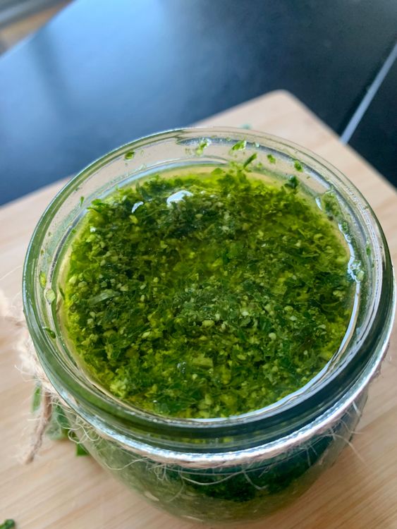 Step 1.1: Transfer to a clean glass jar and top with a thin layer of olive oil to seal in freshness