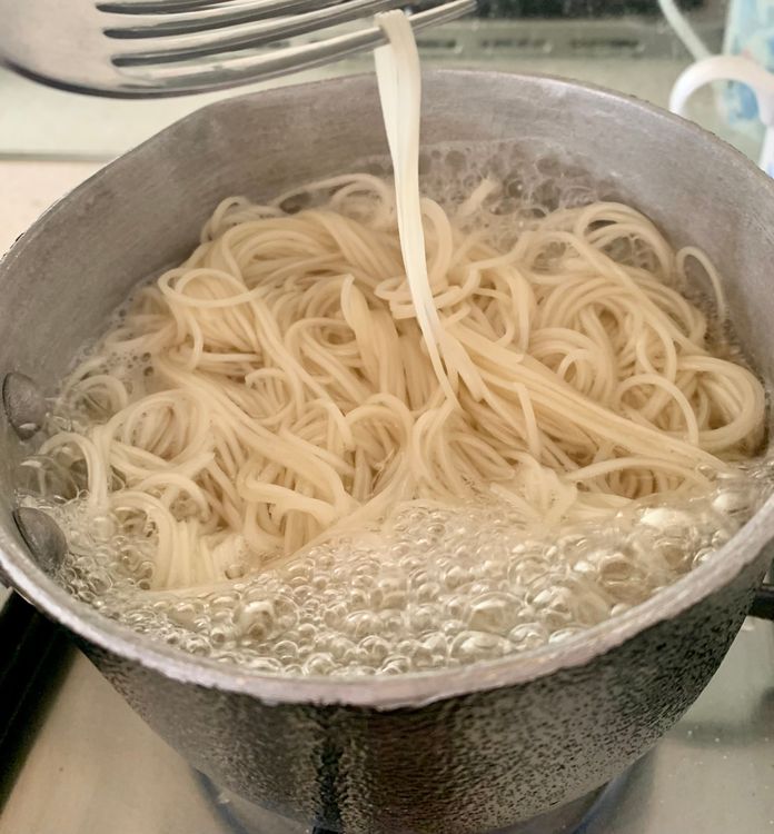 Step 1.1: Boil water in a deep pan and add a pinch of salt