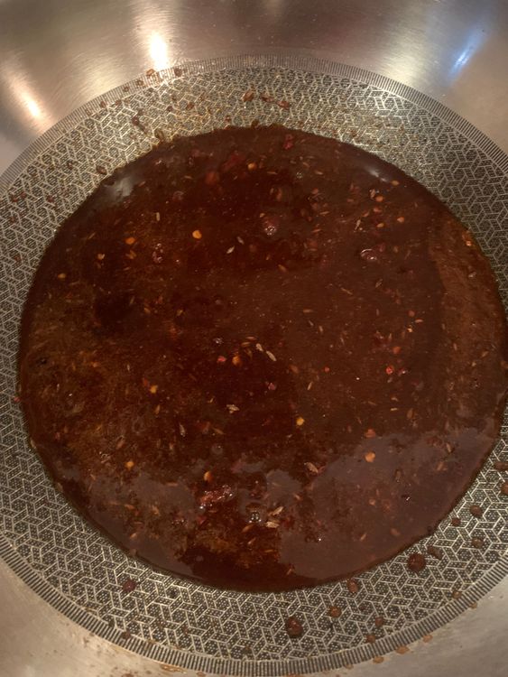 Step 2.1: Add water and jaggery to the pan