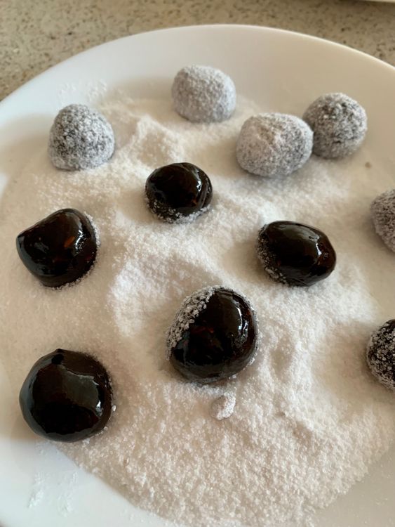 Step 1.1: Lightly grease your fingers and palm with oil, and form the mixture into small balls