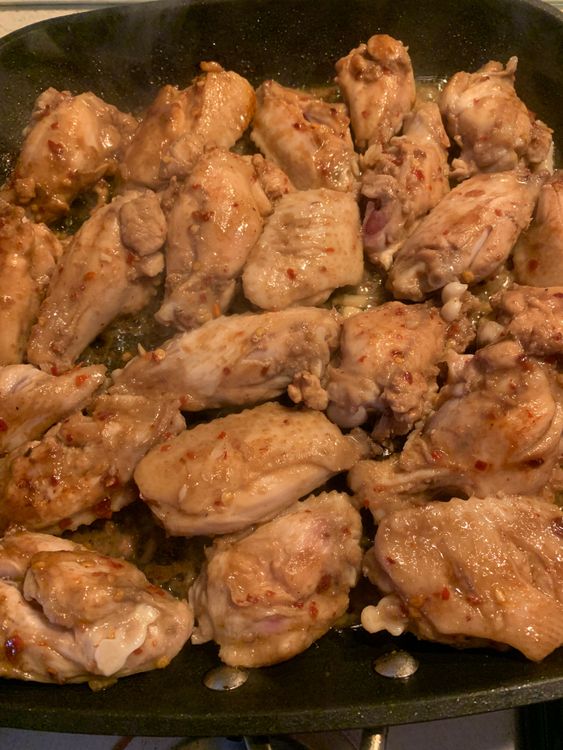 Step 2.1: Grill the chicken wings for about 15-20 minutes, turning occasionally, until they are cooked through and have a nice charred exterior