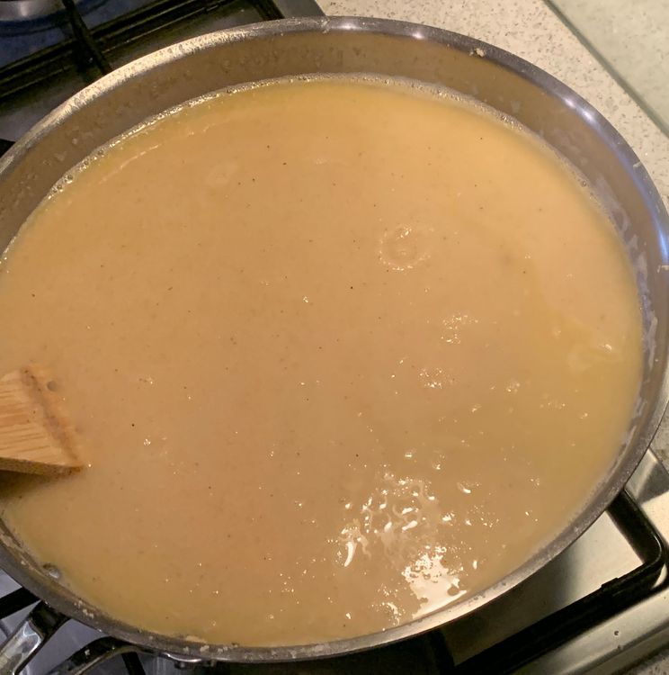 Step 1.1: Reduce the heat to low-medium and let the suji cook for a few minutes until the water is absorbed