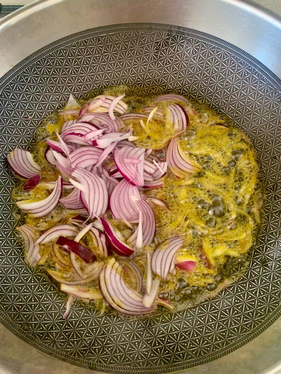 Step 3.1: Add sliced onions and sauté until golden brown