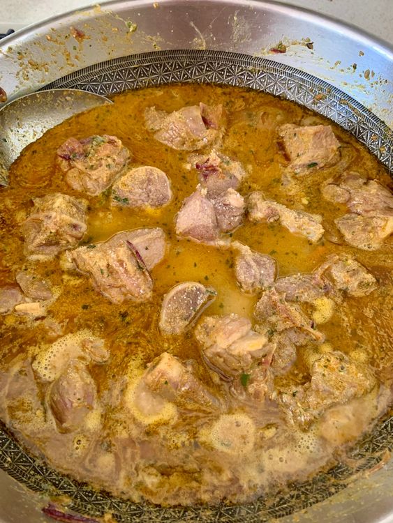 Step 3.1: Pour in hot water, add salt, and bring to a gentle boil