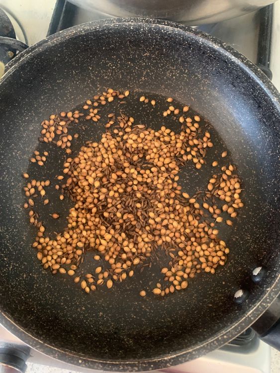 Step 2.1: Dry-roast cumin and coriander seeds together until deep golden but not burnt
