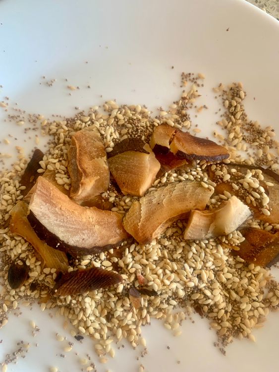 Step 2.1: In a dry pan, roast sliced coconut until lightly golden