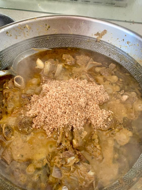 Step 3.1: Stir in the roasted coconut-peanut mixture and garam masala
