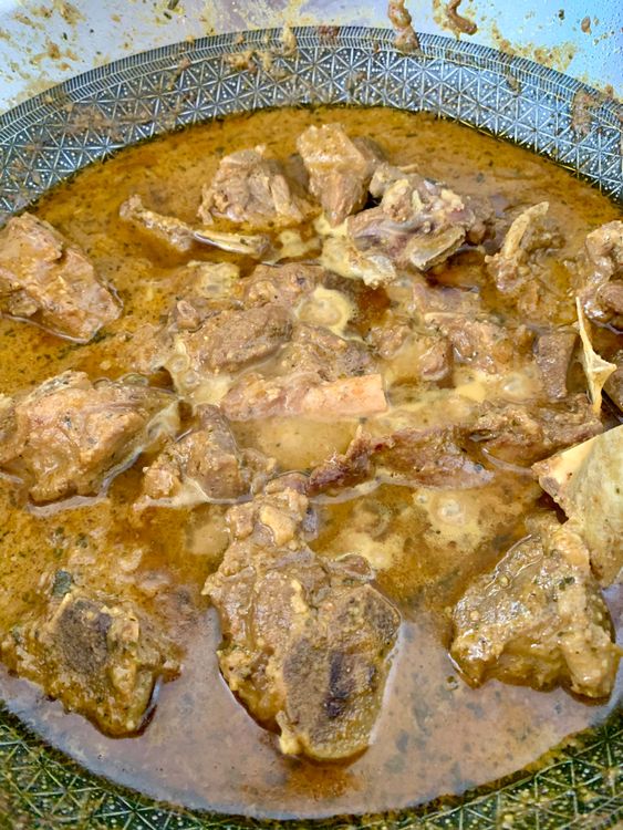 Step 3.1: Continue cooking until the mutton is tender and the gravy thickens slightly