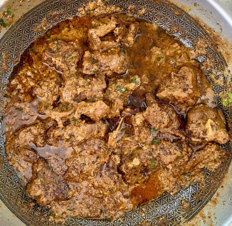 Step 3.2: Add the coarsely ground cumin-coriander mix and chopped coriander leaves