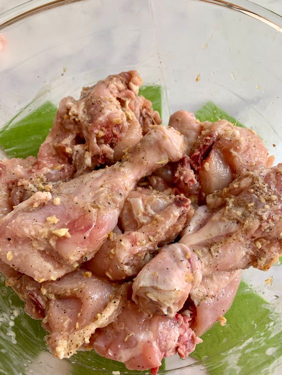 Step 1.1: In a large bowl, combine chicken with ginger-garlic paste, salt, black pepper, and lemon juice