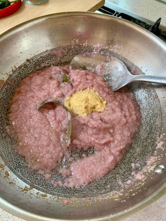Step 3.1: Add ginger-garlic paste and sauté until the raw smell fades