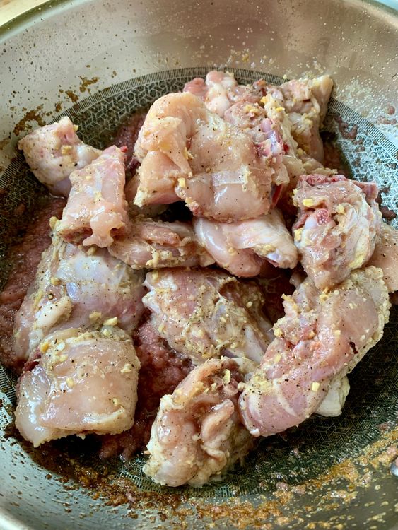Step 3.1: Add the marinated chicken and cook on high flame until it changes colour