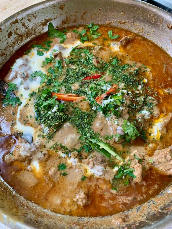 Step 3.1: Add coriander leaves, slit green chillies, kasuri methi, and cream