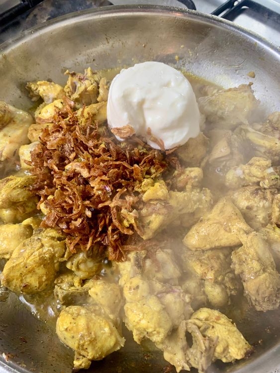 Step 3.1: Add fried onions, leftover marinade (if any), and curd