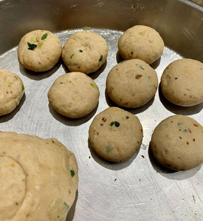 Step 1.1: Take one portion at a time and roll them into smooth balls