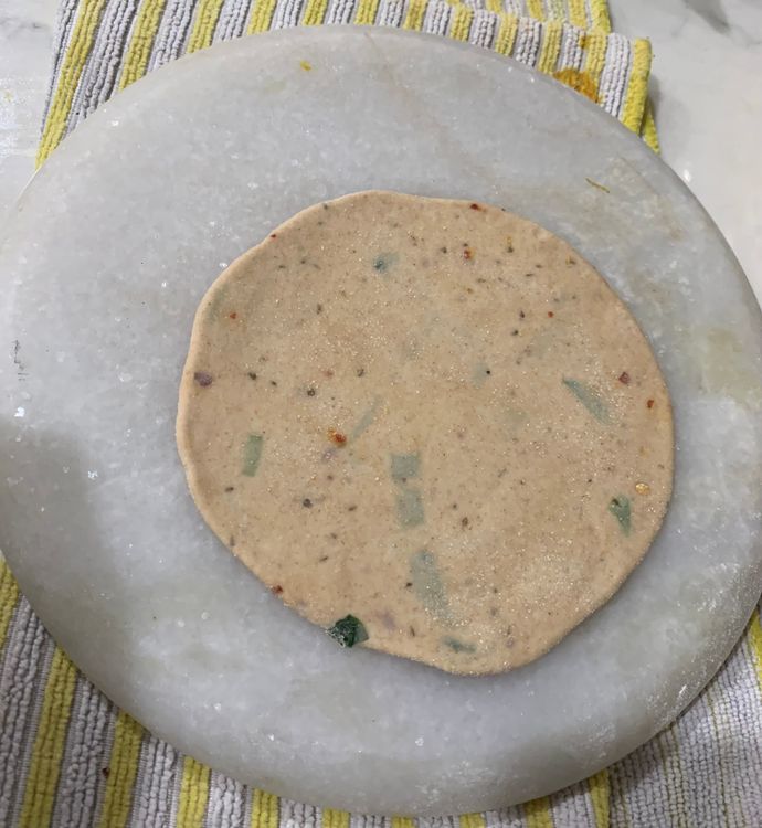Step 1.1: Roll out each dough ball into a flat circle about 3-4 inches in diameter