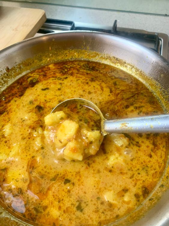 Step 1.1: Lightly mash a few potato pieces in the gravy for a thicker texture