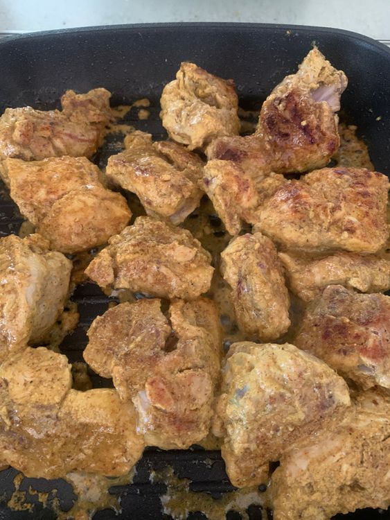 Step 3.1: Arrange the marinated chicken pieces in the pan without crowding; cook in batches if needed