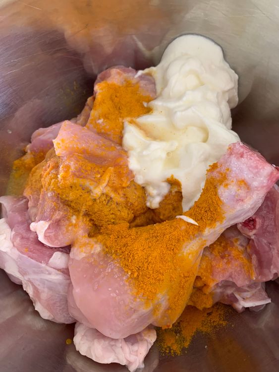 Step 1.1: In a bowl, combine chicken with salt, turmeric, yogurt, and lemon juice