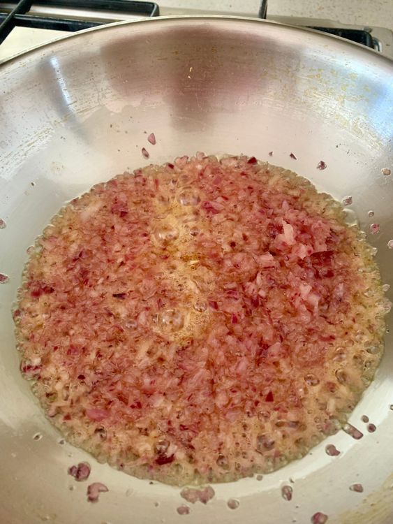 Step 3.1: Add chopped onions and sautΓ© until soft and translucent