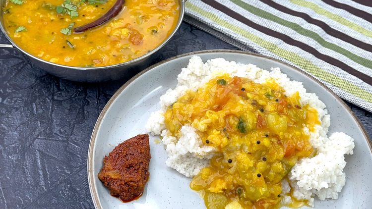 Step 6.2: Add the tempering to the cooked dal