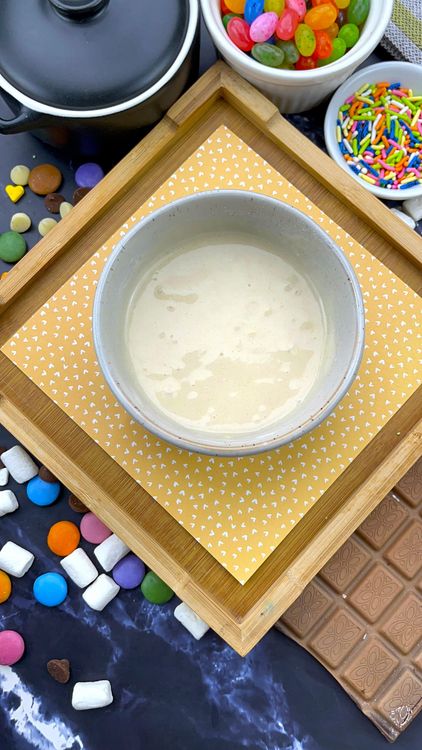 Step 1.2: Add milk, melted butter (or oil), and vanilla extract to the dry ingredients