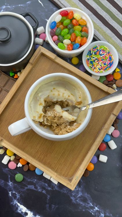Step 5.2: Spread it over the cooled mug cake