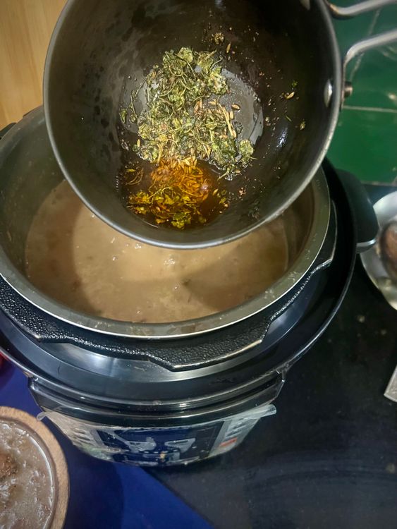 Step 4.2: Mix the final tadka into the dal, reserving some for garnish