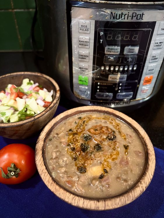 Step 4.1: Top with remaining tadka and sprinkle with chopped coriander leaves before serving