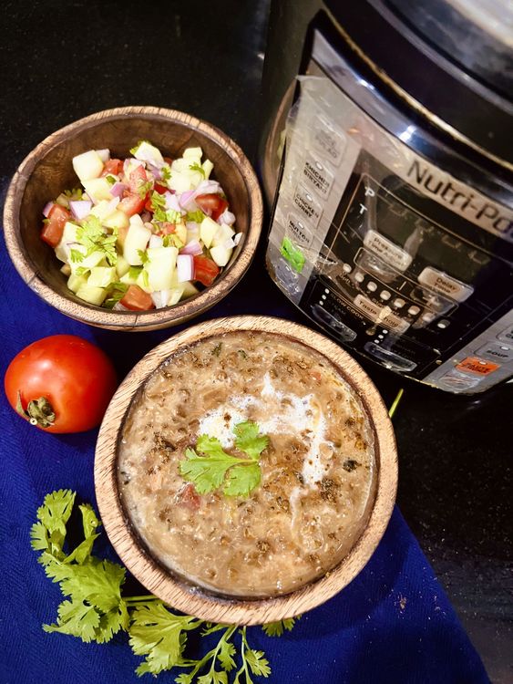 Step 4.1: Place the dal in a serving bowl and mix in a few tablespoons of heavy cream or malai