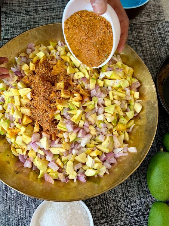 Step 1.1: Add this pickle masala to the mangoes