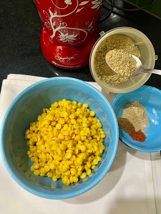 Step 1.4: For the dal, drain any excess water and add all the dry spices, chaat masala, coriander stems, and lemon juice for a fresh flavor
