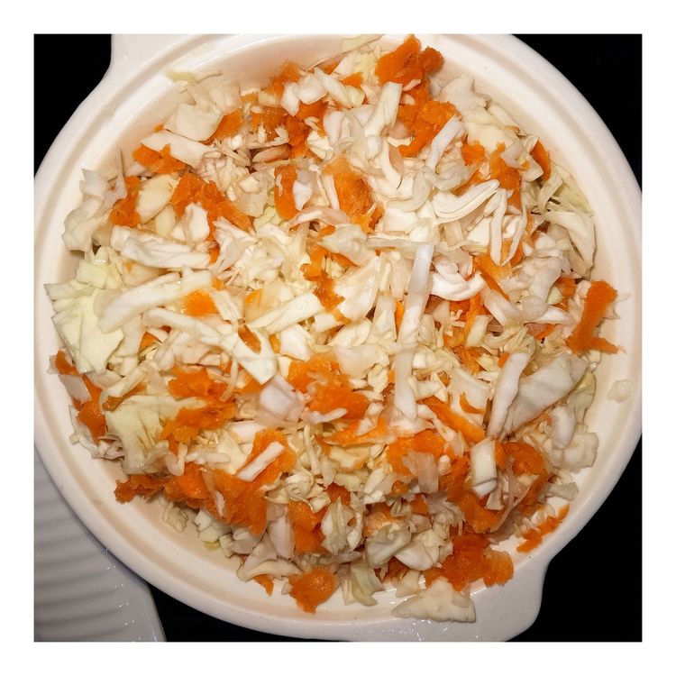 Step 1.1: Combine the shredded cabbage and grated carrot in a bowl, then refrigerate for 20 minutes