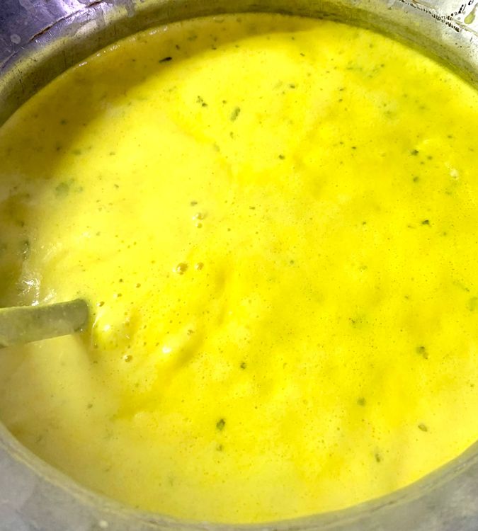 Step 1.1: Reduce the flame to low-medium heat and allow the kadhi mixture to simmer for atleast 30-40 minutes