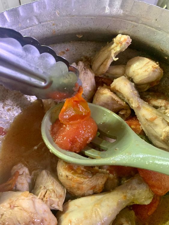 Step 1.1: Remove the skin of the tomatoes with a tong or a fork