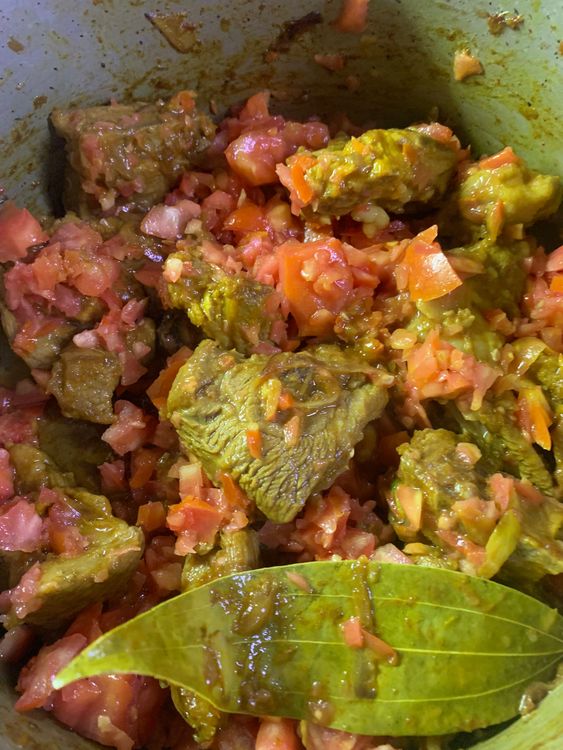 Step 1.1: Add the chopped tomatoes and tomato puree