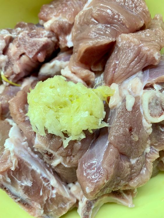 Step 1.1: Marinate the mutton pieces with crushed garlic (half tsp) for at least an hour before cooking and set it aside