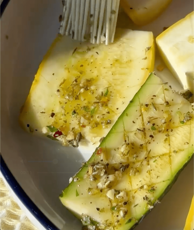 Step 2.1: Brush the seasoning mixture generously over the zucchini and squash