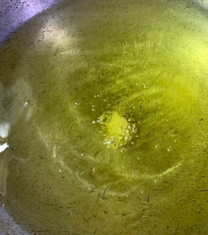 Step 1.1: Heat oil in a heavy-bottomed deep pan or wok over medium heat