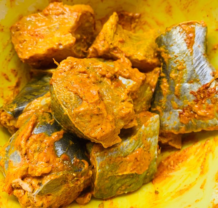 Step 2.1: Coat the fish pieces evenly with the spice mixture