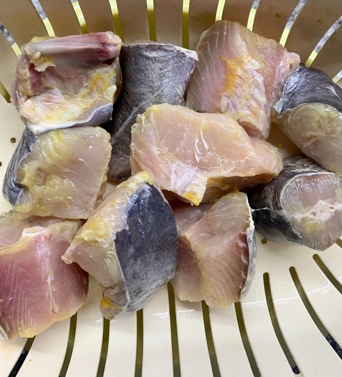 Step 1.1: Drain water and wash the fish pieces once again in running water