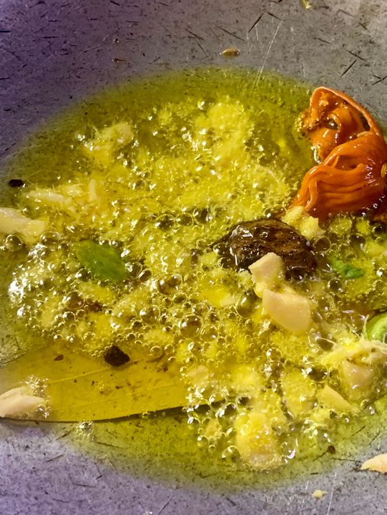 Step 3.1: Add bay leaf, black cardamom, green cardamom, cinnamon stick, mace, and fry for a few seconds or until fragrant