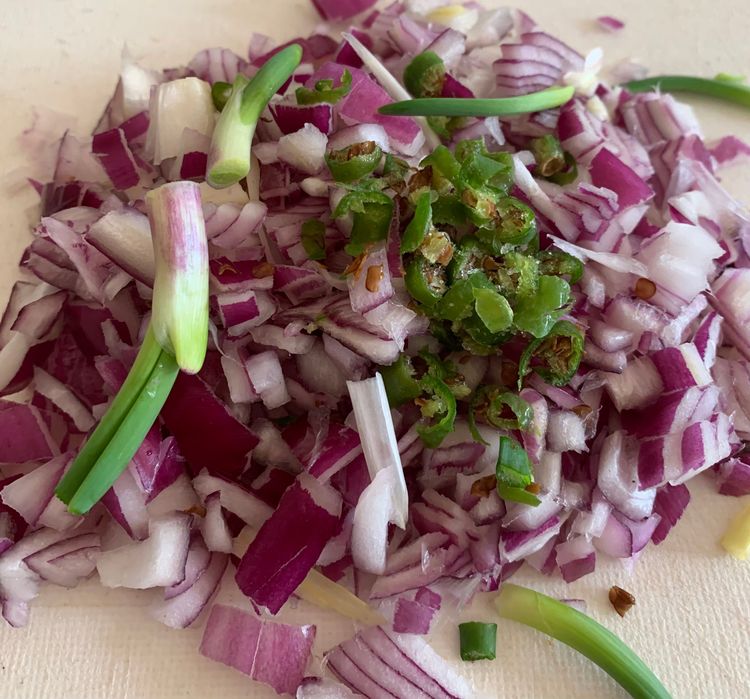 Step 2.1: Chop the onions and chillies and put them in a mixing bowl