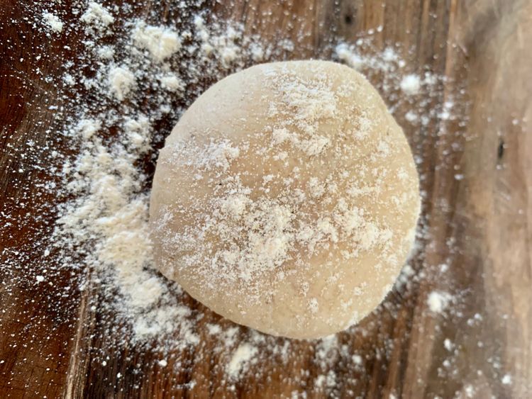Step 2.1: Take a small portion of the dough and make a ball