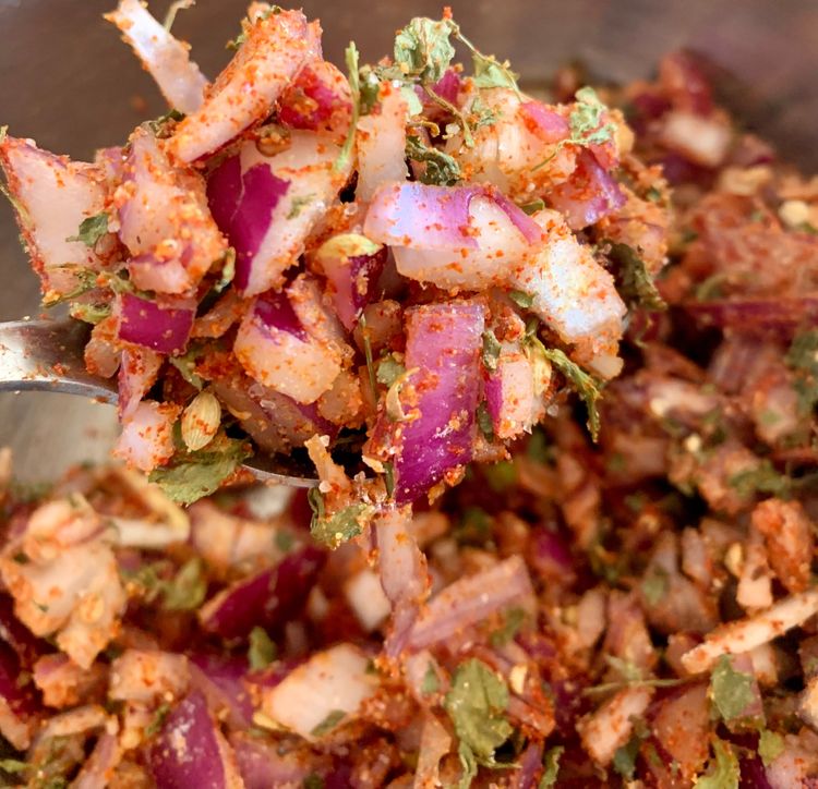 Step 2.2: Add roasted gram flour, salt, red chilli powder, coriander powder, carom seeds, pomegranate seeds and fenugreek leaves
